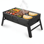 Portable grill with food on a white background