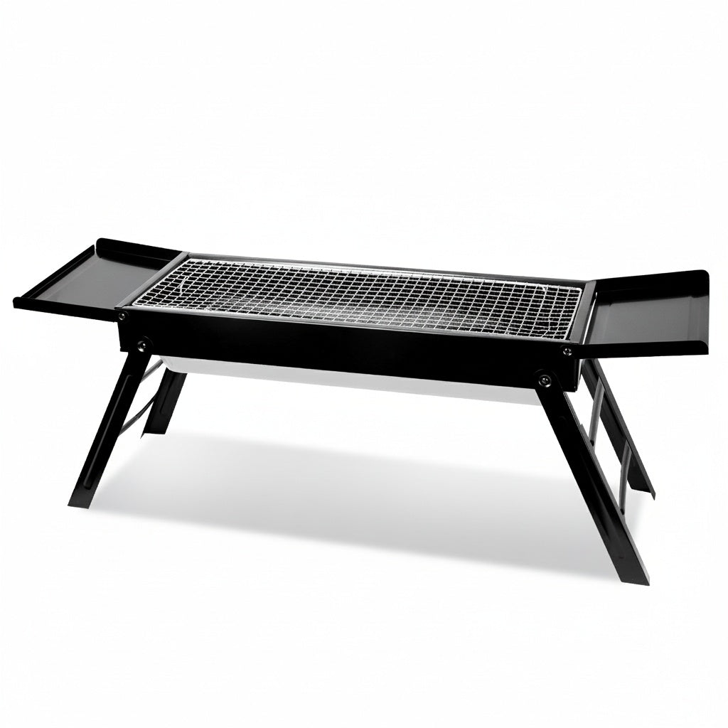 Black portable grill on a white background