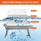 Detachable BBQ grill with ash tray and charcoal tray on a water background
